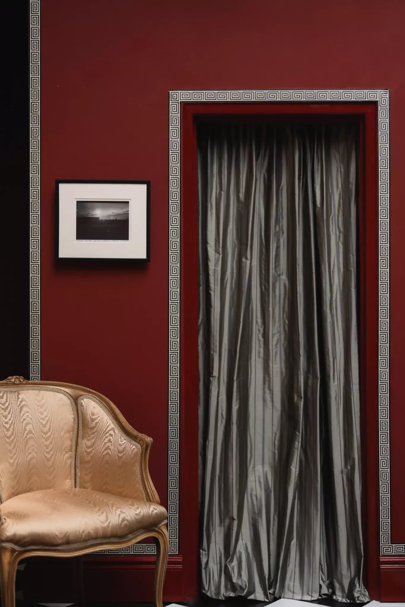 A view of tafta stripe fabric in grey showcasing its navy blue stripes, texture and reflective quality as curtains,  available  to buy on the-salon.com. SALON curates the finest , unique, handmade pieces from the interior industry's best makers and brands. Shop luxury furniture, lighting, rugs, art, antiques and vintage pieces and accessories from SALON interior designed rooms.