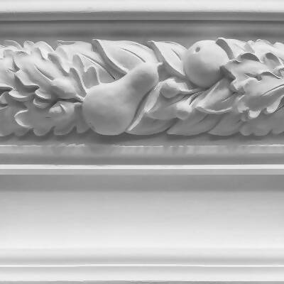 A close-up of a classic victorian cornice with intricate leaf-like patterns, available  to buy on the-salon.com. SALON curates the finest , unique, handmade pieces from the interior industry's best makers and brands. Shop luxury furniture, lighting, rugs, art, antiques and vintage pieces and accessories from SALON interior designed rooms