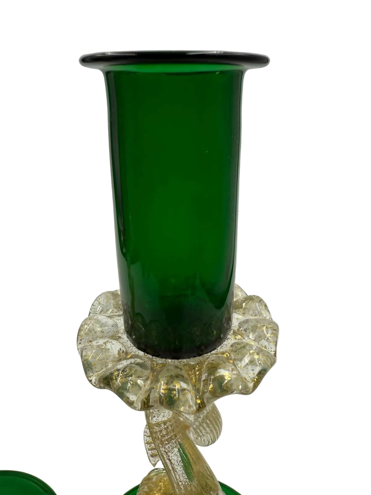A green glass candlestick holder with a cylindrical deep green glass cup and a clear, textured, scalloped glass base on a white background.