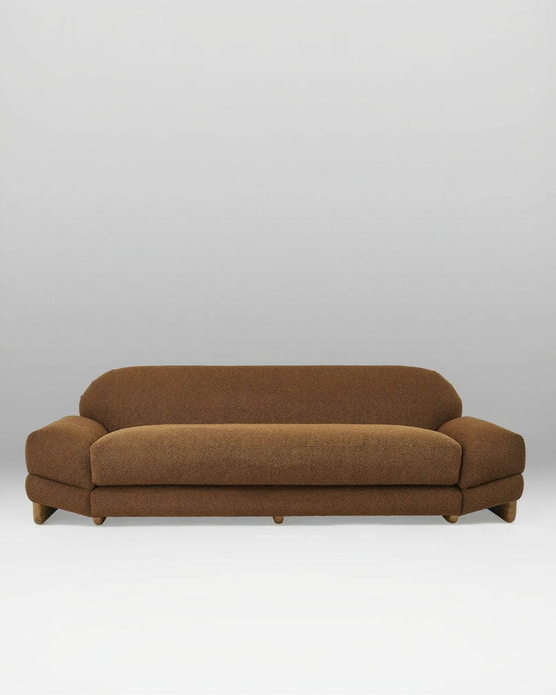 Brown sofa on a gray background