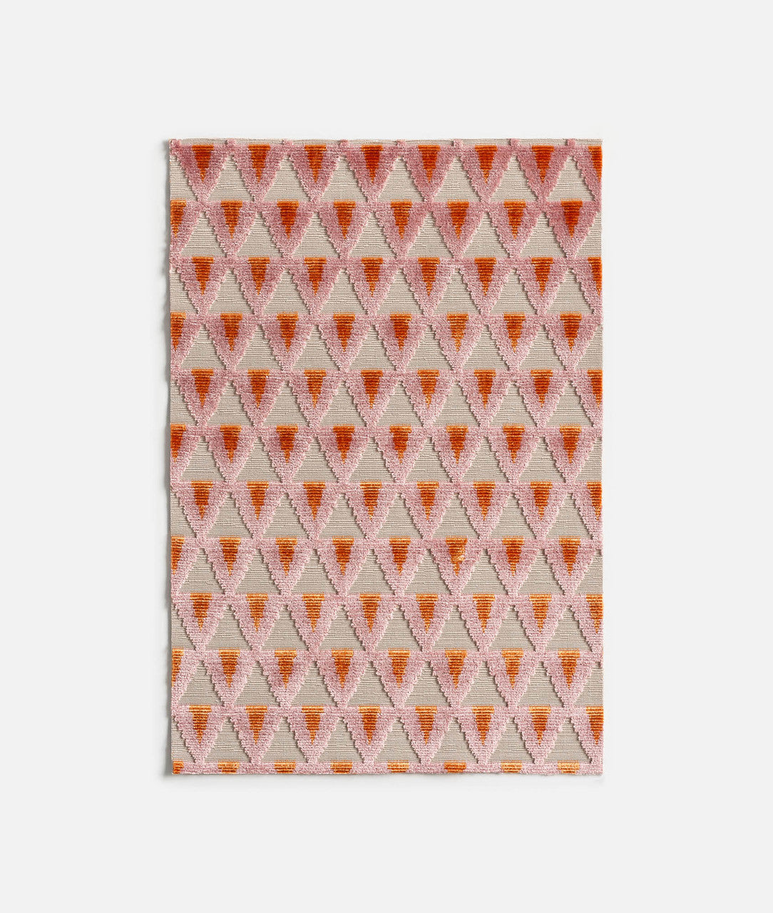 Rug with orange, pink and white geometric pattern on a white background,available  to buy on the-salon.com. SALON curates the finest , unique, handmade pieces from the interior industry's best makers and brands. Shop luxury furniture, lighting, rugs, art, antiques and vintage pieces and accessories from SALON interior designed rooms