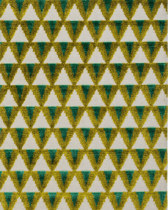 Patterned fabric with green, white, and yellow triangles on a white background,available  to buy on the-salon.com. SALON curates the finest , unique, handmade pieces from the interior industry's best makers and brands. Shop luxury furniture, lighting, rugs, art, antiques and vintage pieces and accessories from SALON interior designed rooms