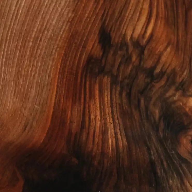 A close up of the wooden grains on the wooden cabinet, in the shade English walnut-  available  to buy on the-salon.com. SALON curates the finest , unique, handmade pieces from the interior industry's best makers and brands. Shop luxury furniture, lighting, rugs, art, antiques and vintage pieces and accessories from SALON interior designed rooms.
