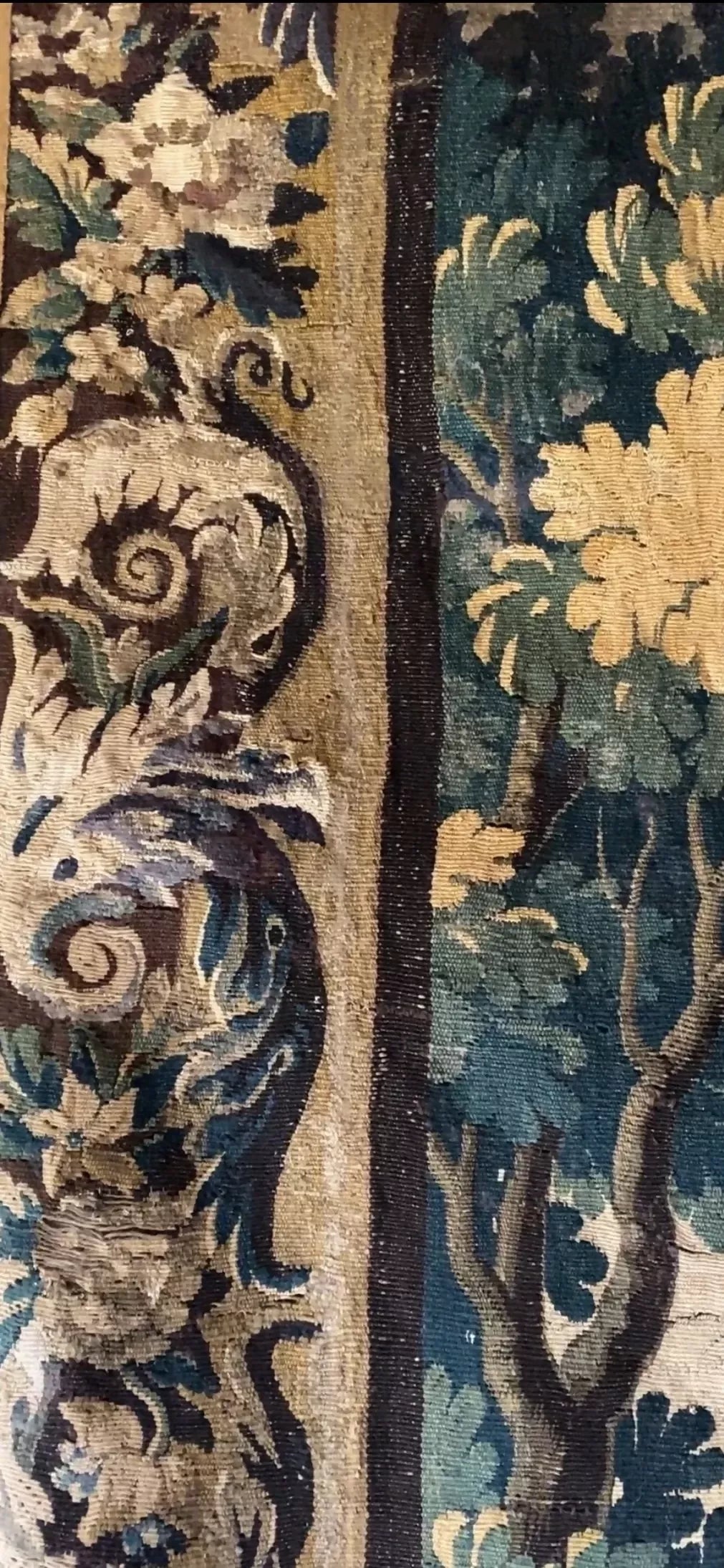 Close-up of a patterned fabric with floral and scroll designs,  available  to buy on the-salon.com. SALON curates the finest , unique, handmade pieces from the interior industry's best makers and brands. Shop luxury furniture, lighting, rugs, art, antiques and vintage pieces and accessories from SALON interior designed rooms.