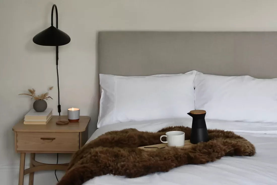 Brown sheepskin rug. The rug, available to buy from the-salon.com. SALON curates the finest unique handmade pieces from the interior industry's best makers and brands. Shop luxury furniture, lighting, rugs, art, antiques and vintage pieces and accessories from SALON interior designed rooms.