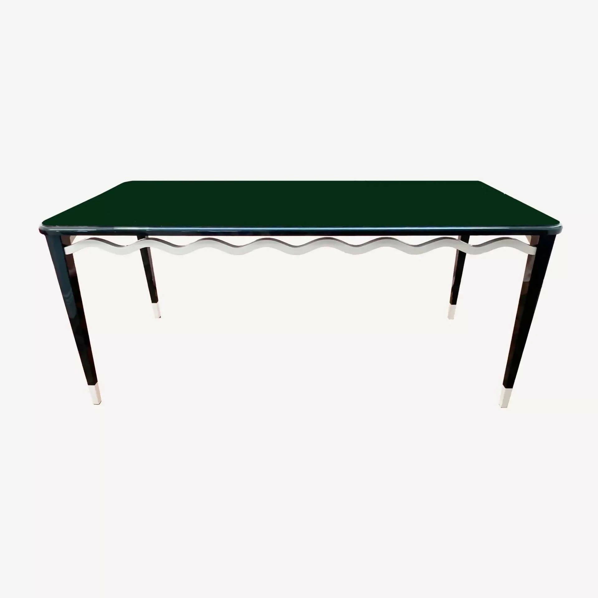 THE SERPENTINE TABLE BY STUDIO HOLLOND