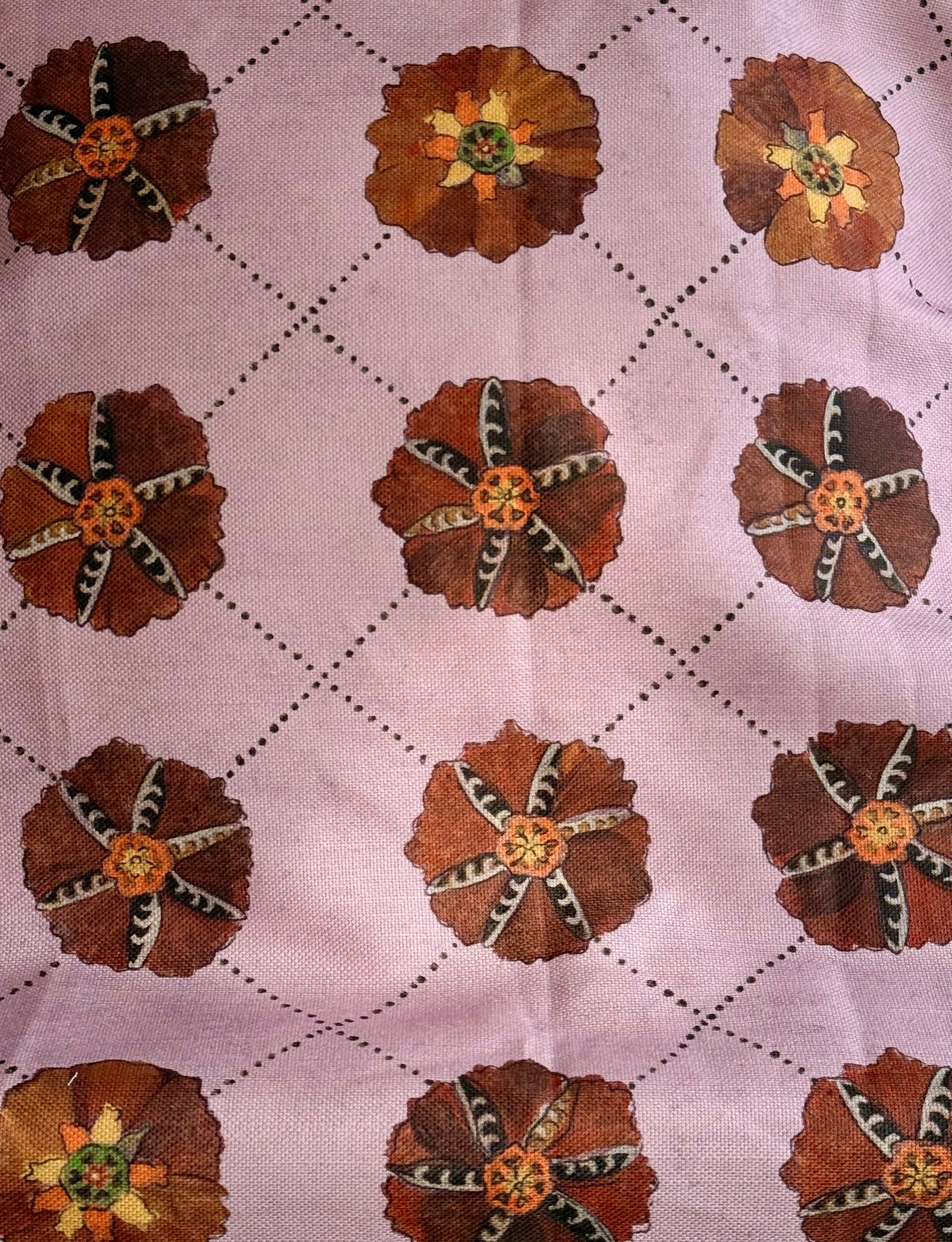 A piece of suzani fabric with floral patterns in beige, brown, and multicolor hues,  available  to buy on the-salon.com. SALON curates the finest , unique, handmade pieces from the interior industry's best makers and brands. Shop luxury furniture, lighting, rugs, art, antiques and vintage pieces and accessories from SALON interior designed rooms.