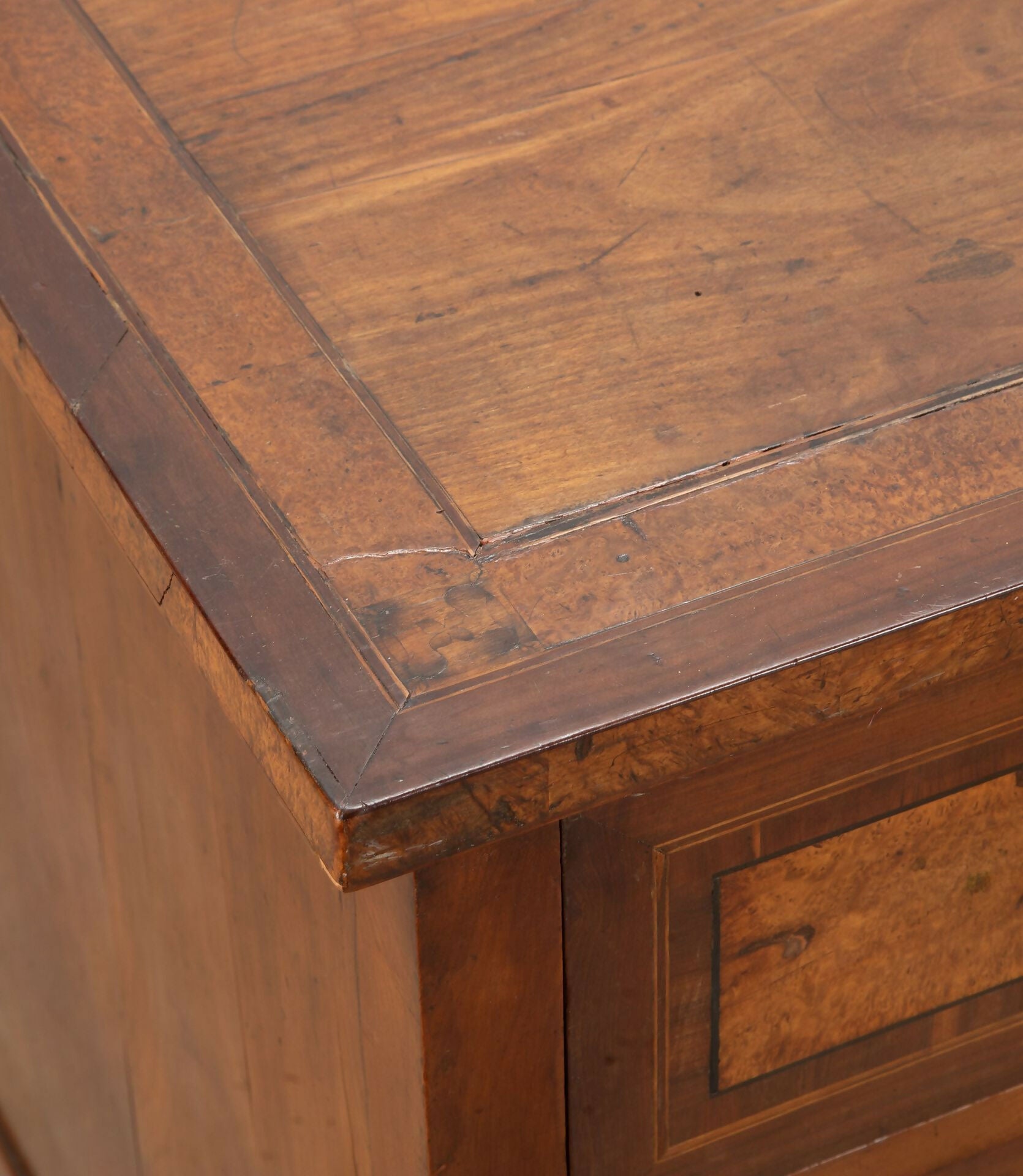 Close-up of a wooden surface with visible grain and texture,  available  to buy on the-salon.com. SALON curates the finest , unique, handmade pieces from the interior industry's best makers and brands. Shop luxury furniture, lighting, rugs, art, antiques and vintage pieces and accessories from SALON interior designed rooms.