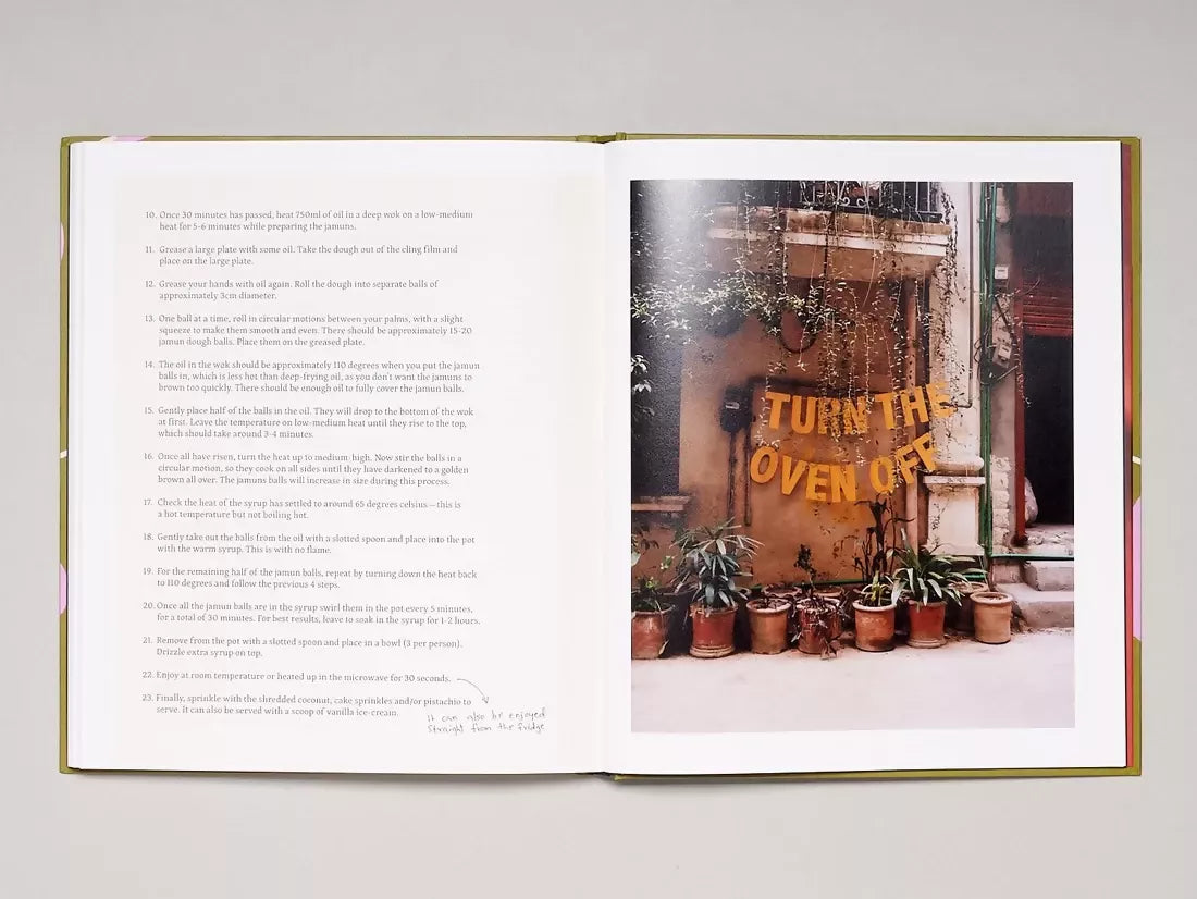 Open book, pages to an image of a yellow sign saying 'turn the hob off' above potted plants, beneath a balcony, the other side is another recipe,  available  to buy on the-salon.com. SALON curates the finest , unique, handmade pieces from the interior industry's best makers and brands. Shop luxury furniture, lighting, rugs, art, antiques and vintage pieces and accessories from SALON interior designed rooms.