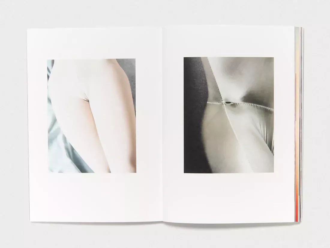 An open book, two images of a woman nude from the waist down,  available  to buy on the-salon.com. SALON curates the finest , unique, handmade pieces from the interior industry's best makers and brands. Shop luxury furniture, lighting, rugs, art, antiques and vintage pieces and accessories from SALON interior designed rooms.