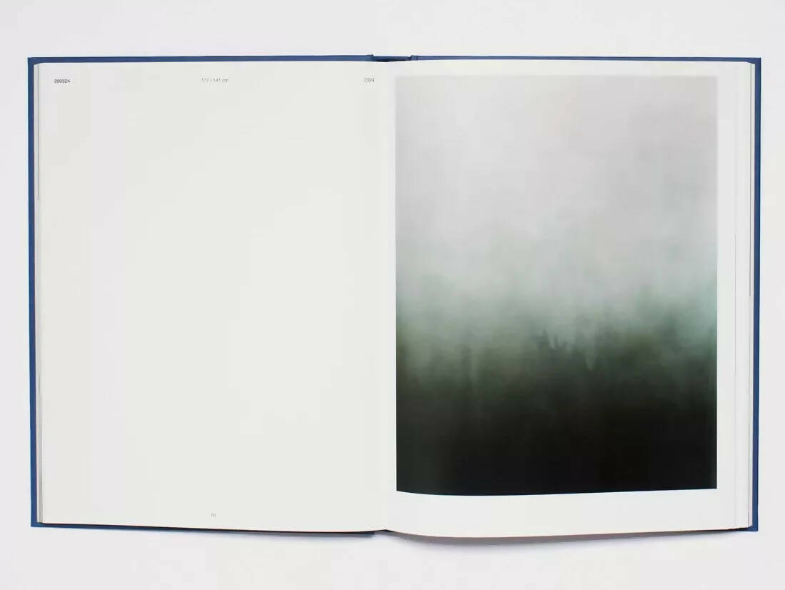 An image of an open book, containing one blank white page and the other photo being a gradient of white and dark tones, available  to buy on the-salon.com. SALON curates the finest , unique, handmade pieces from the interior industry's best makers and brands. Shop luxury furniture, lighting, rugs, art, antiques and vintage pieces and accessories from SALON interior designed rooms.