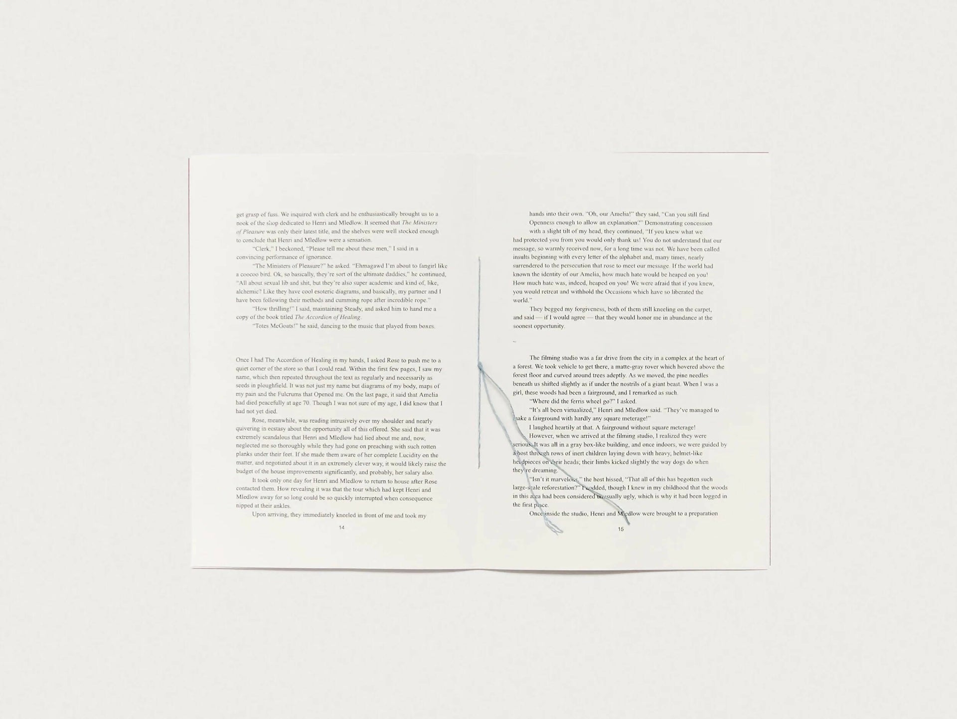 An image of an open book, with black writing and white pages, available  to buy on the-salon.com. SALON curates the finest , unique, handmade pieces from the interior industry's best makers and brands. Shop luxury furniture, lighting, rugs, art, antiques and vintage pieces and accessories from SALON interior designed rooms.