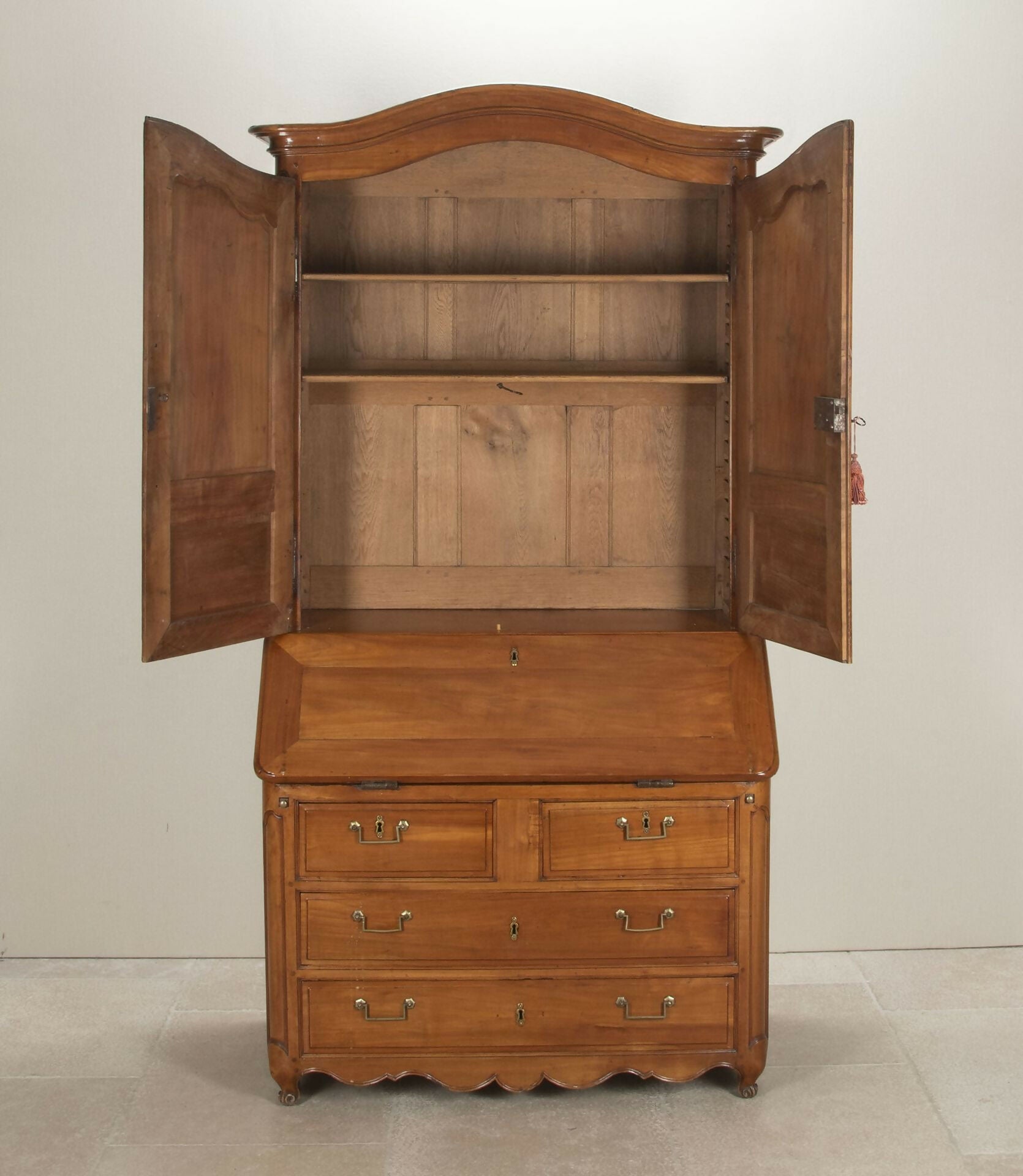 Wooden cabinet with open doors on a plain background,  available  to buy on the-salon.com. SALON curates the finest , unique, handmade pieces from the interior industry's best makers and brands. Shop luxury furniture, lighting, rugs, art, antiques and vintage pieces and accessories from SALON interior designed rooms.