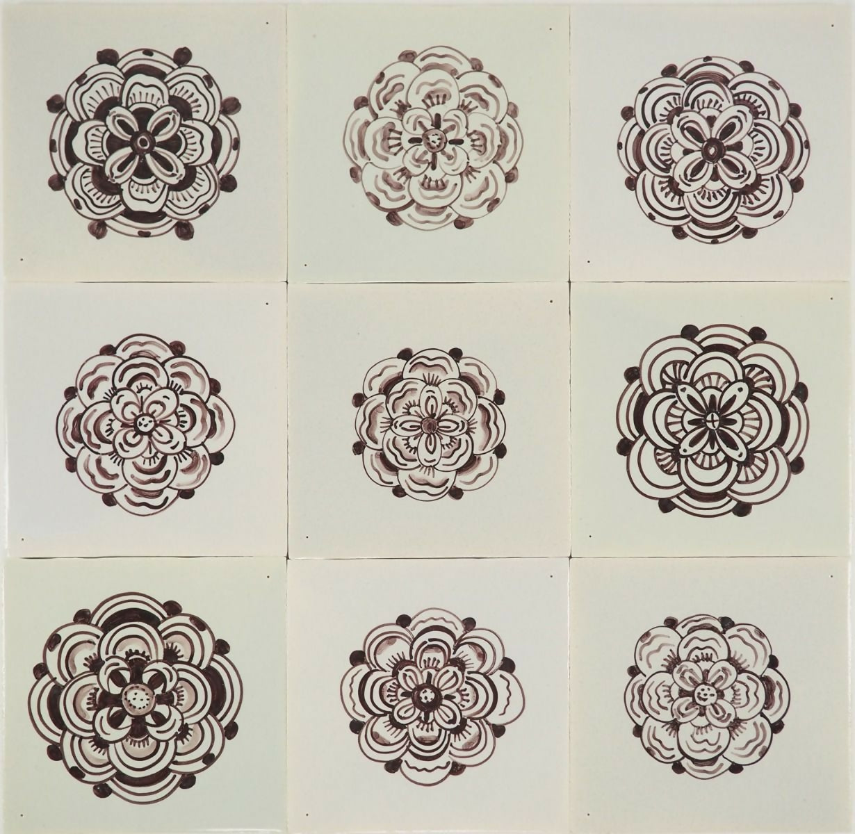 Nine black and white floral patterns arranged in a 3x3 grid on a light background,  available  to buy on the-salon.com. SALON curates the finest , unique, handmade pieces from the interior industry's best makers and brands. Shop luxury furniture, lighting, rugs, art, antiques and vintage pieces and accessories from SALON interior designed rooms.