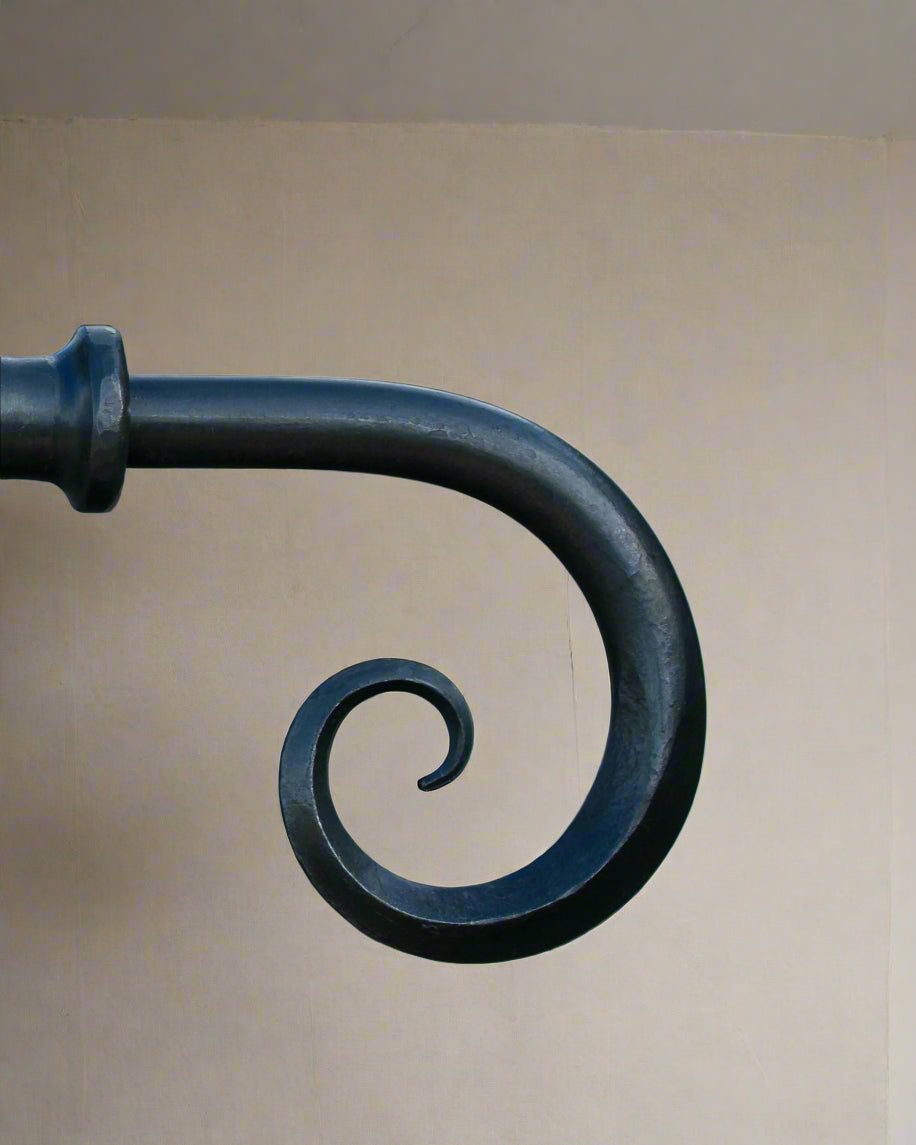 Squared edged scroll finial