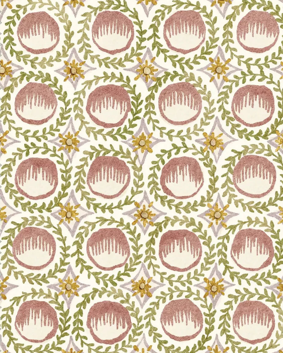 Patterned wallpaper with red circles and green leaves on a white background