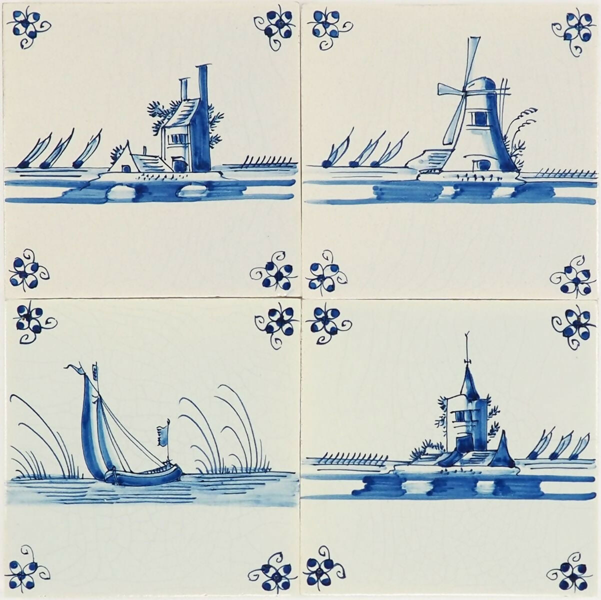 Set of four blue and white ceramic tiles with scenic designs,  available  to buy on the-salon.com. SALON curates the finest , unique, handmade pieces from the interior industry's best makers and brands. Shop luxury furniture, lighting, rugs, art, antiques and vintage pieces and accessories from SALON interior designed rooms.