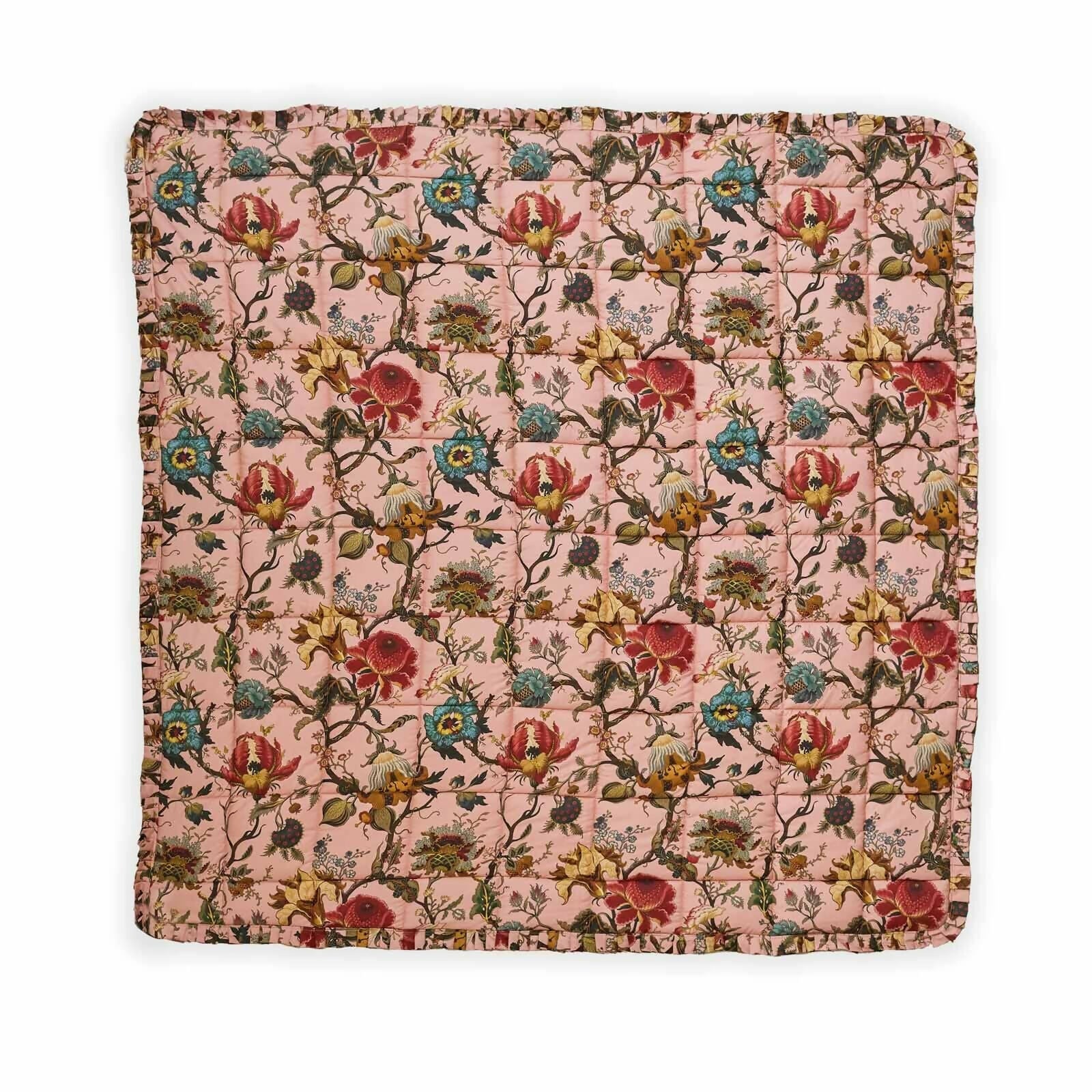 Floral patterned quilt on a white background,available to buy from the-salon.com. SALON curates the finest unique handmade pieces from the interior industry's best makers and brands. Shop luxury furniture, lighting, rugs, art, antiques and vintage pieces and accessories from SALON interior designed rooms. 