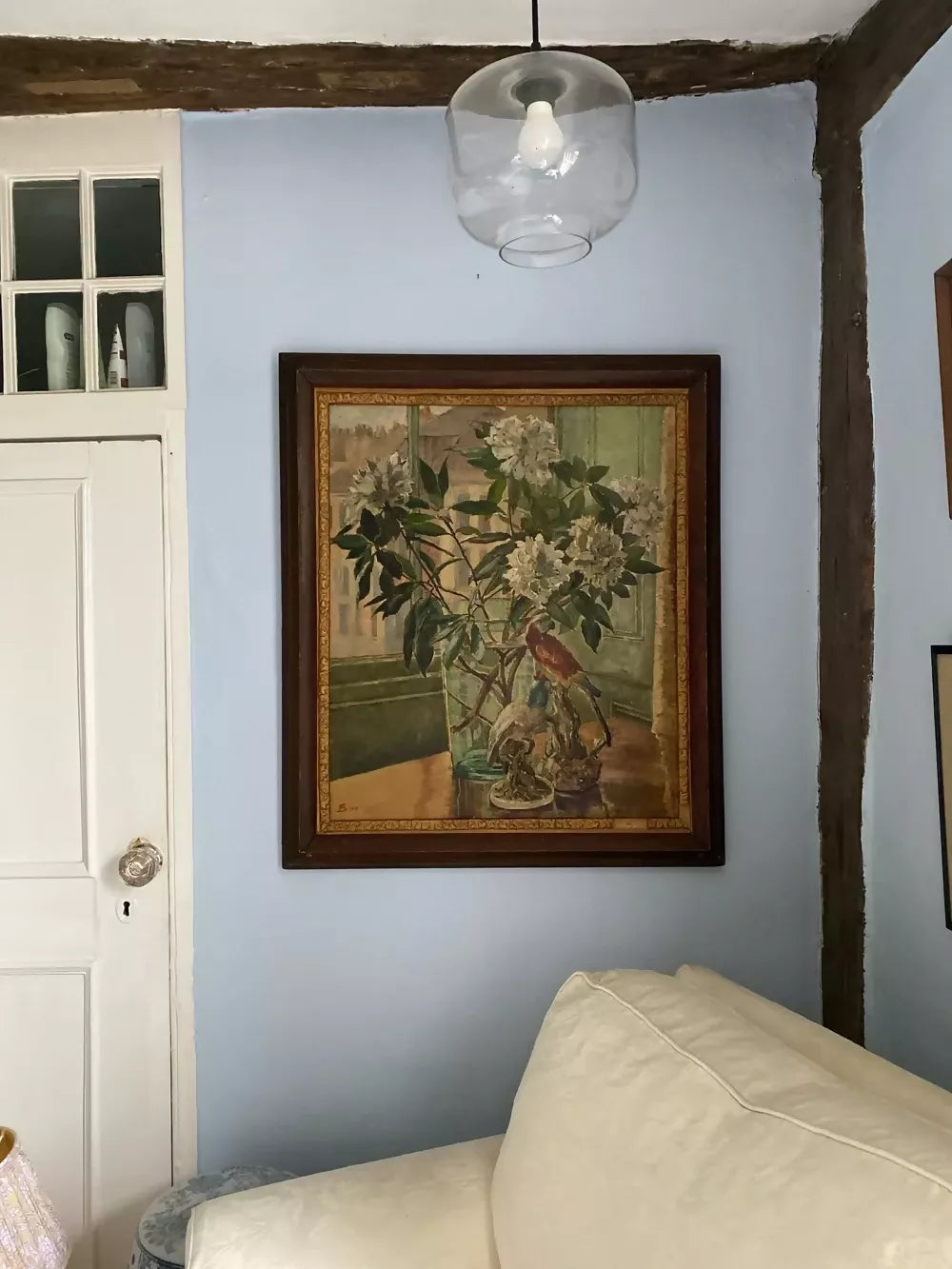 Framed painting of a still life with flowers and birds on a table available to buy from the-salon.com. SALON curates the finest unique handmade pieces from the interior industry's best makers and brands. Shop luxury furniture, lighting, rugs, art, antiques and vintage pieces and accessories from SALON interior designed rooms.