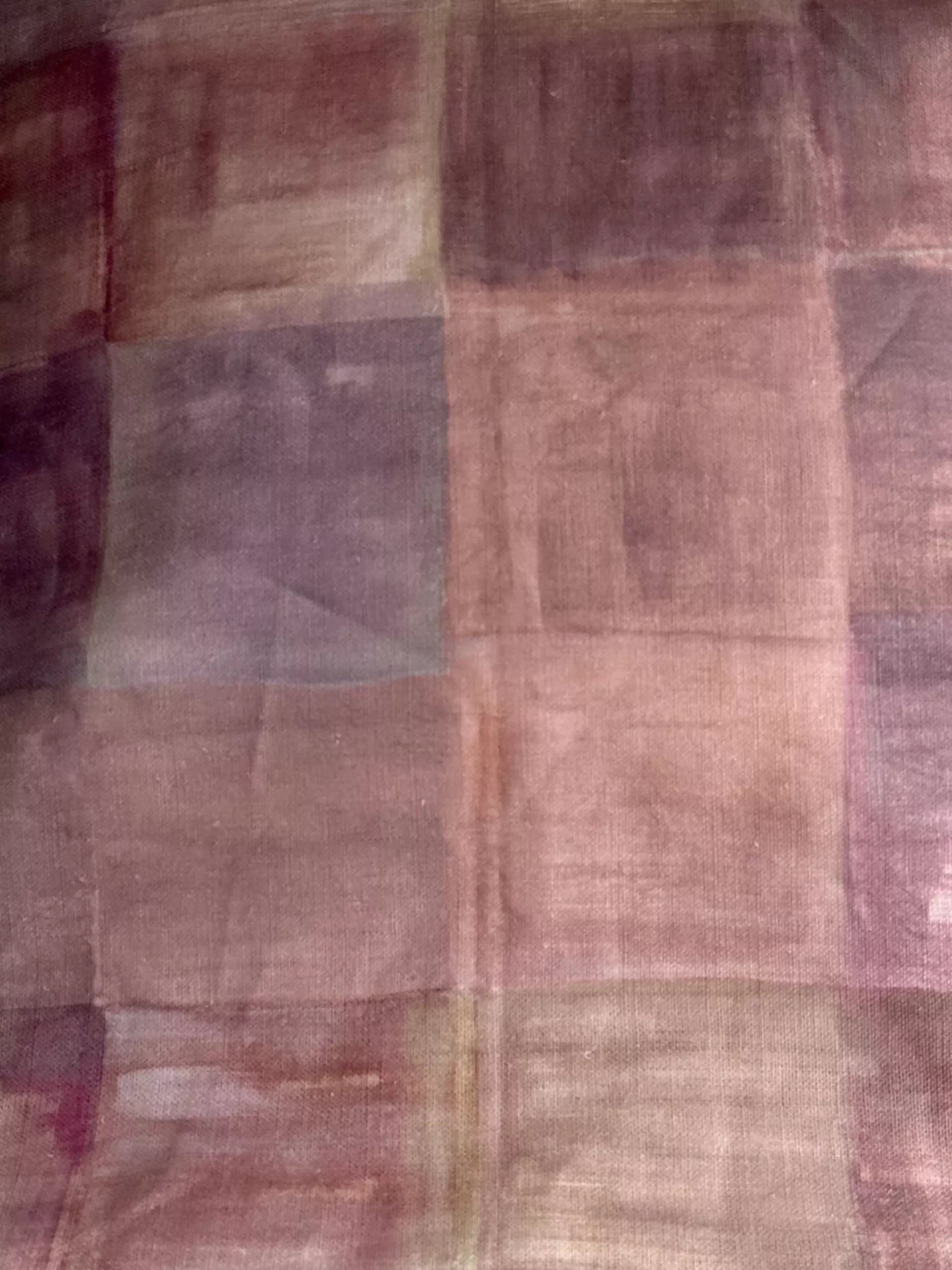 A close-up of a plaid fabric featuring a pattern of various solid colors, including pink, purple,  available  to buy on the-salon.com. SALON curates the finest , unique, handmade pieces from the interior industry's best makers and brands. Shop luxury furniture, lighting, rugs, art, antiques and vintage pieces and accessories from SALON interior designed rooms.