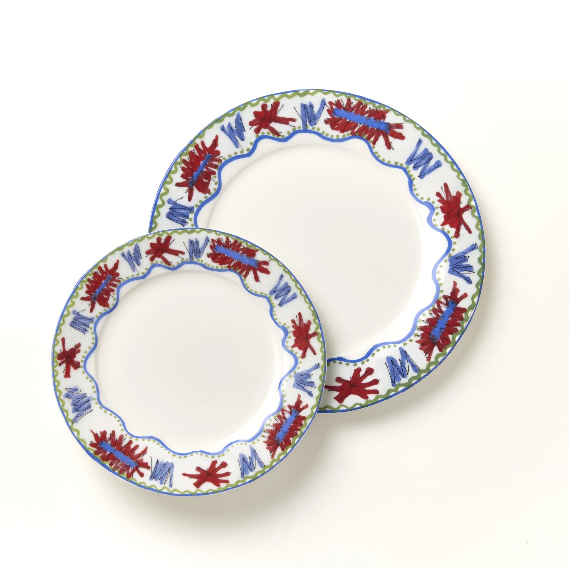 SET OF 4 URCHIN DINNER PLATES BY THE CL COLLECTION