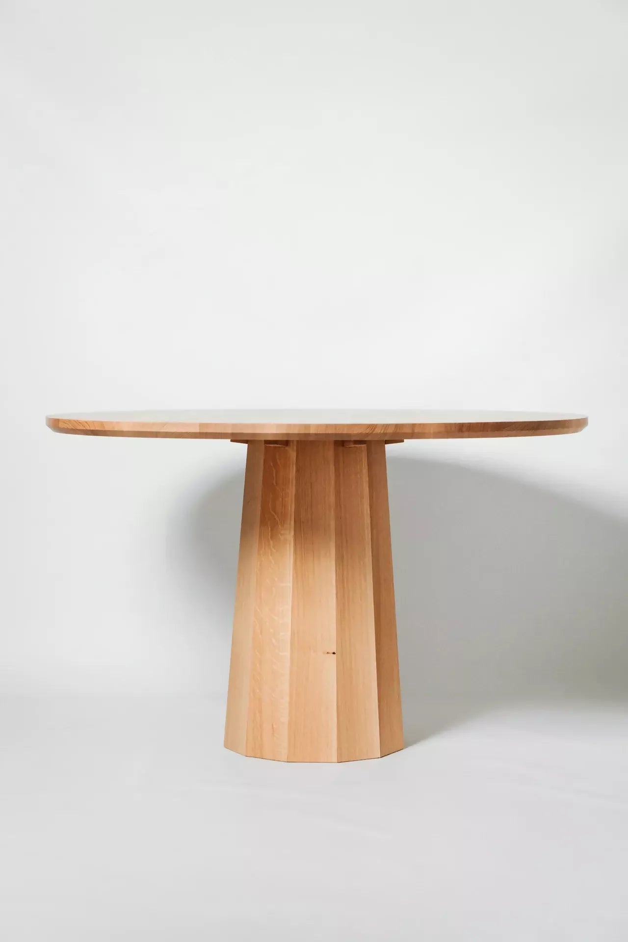 POLYGON PEDESTAL DINING TABLE BY GALVIN BROTHERS