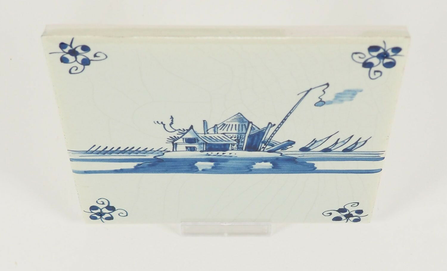 Rectangular ceramic dish with blue floral and landscape design on a white background,  available  to buy on the-salon.com. SALON curates the finest , unique, handmade pieces from the interior industry's best makers and brands. Shop luxury furniture, lighting, rugs, art, antiques and vintage pieces and accessories from SALON interior designed rooms.