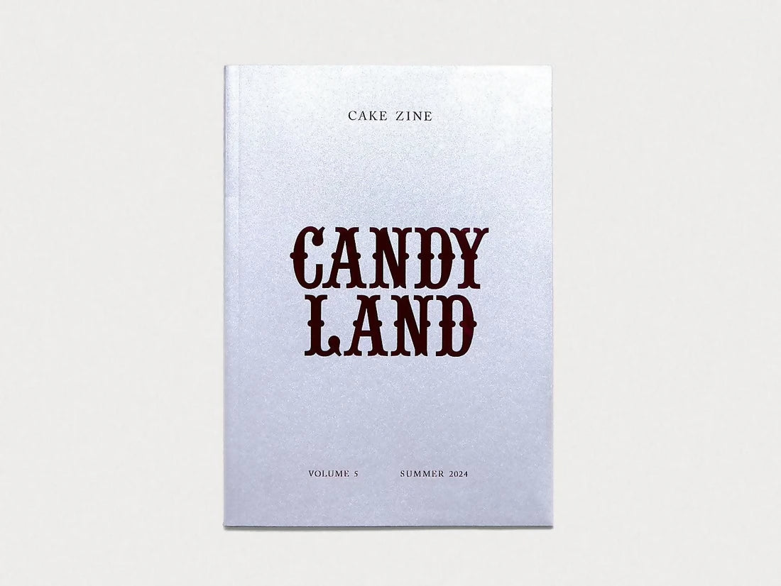 Cover of 'CANDY LAND' by Cake Zine, featuring stylized text on a white background,  available  to buy on the-salon.com. SALON curates the finest , unique, handmade pieces from the interior industry's best makers and brands. Shop luxury furniture, lighting, rugs, art, antiques and vintage pieces and accessories from SALON interior designed rooms.