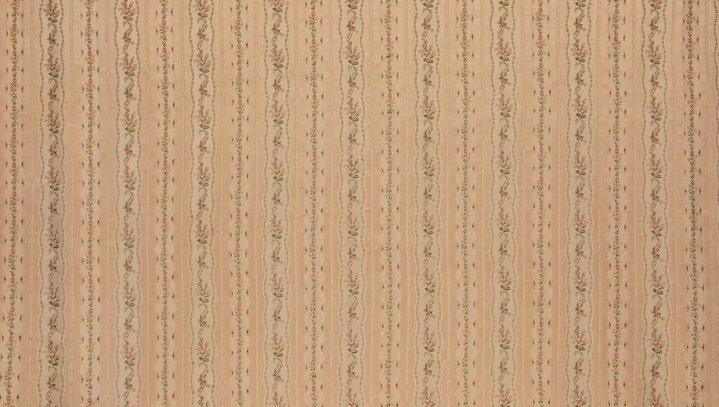 Close-up of Spitalfields stripe blush fabric with a jacquard weave showcasing floral motifs and silk edges,  available  to buy on the-salon.com. SALON curates the finest , unique, handmade pieces from the interior industry's best makers and brands. Shop luxury furniture, lighting, rugs, art, antiques and vintage pieces and accessories from SALON interior designed rooms.