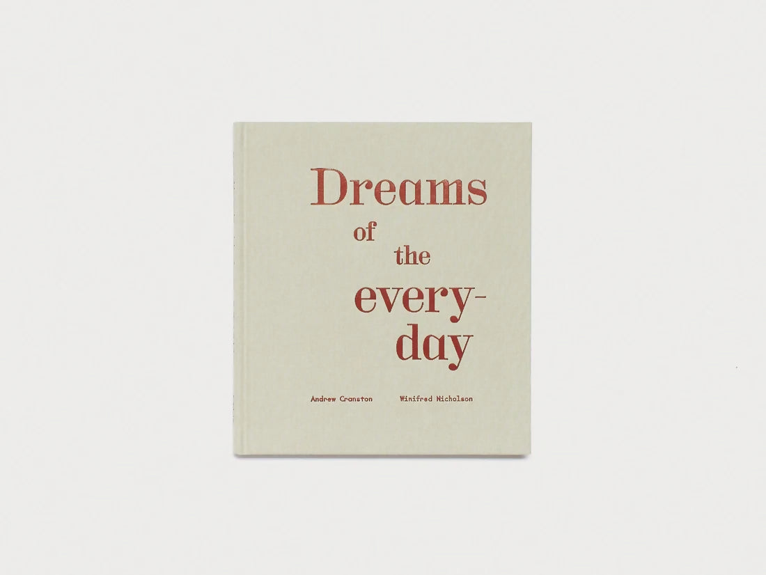 Book titled 'Dreams of the Everyday' with red text on a beige background,available to buy from the-salon.com. SALON curates the finest unique handmade pieces from the interior industry's best makers and brands. Shop luxury furniture, lighting, rugs, art, antiques and vintage pieces and accessories from SALON interior designed rooms. 