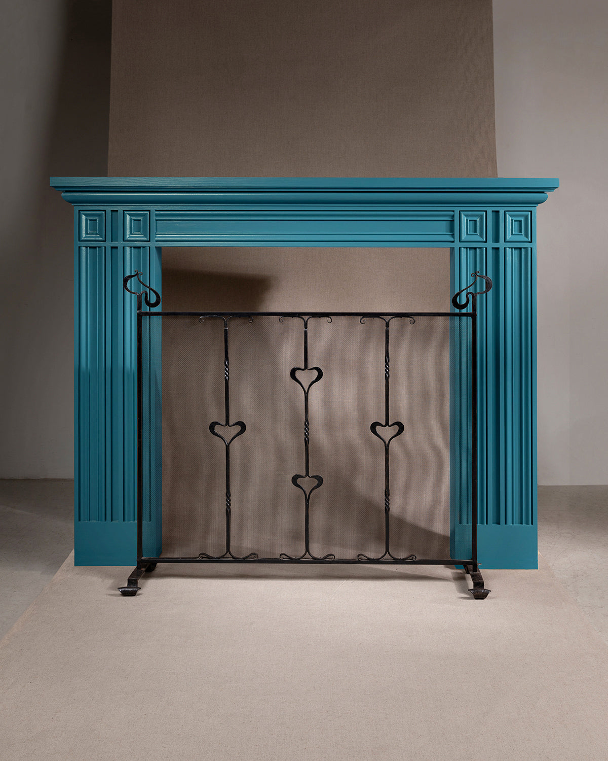 An image of a standalone fireplace infront of a dark background,  available  to buy on the-salon.com. SALON curates the finest , unique, handmade pieces from the interior industry's best makers and brands. Shop luxury furniture, lighting, rugs, art, antiques and vintage pieces and accessories from SALON interior designed rooms.
