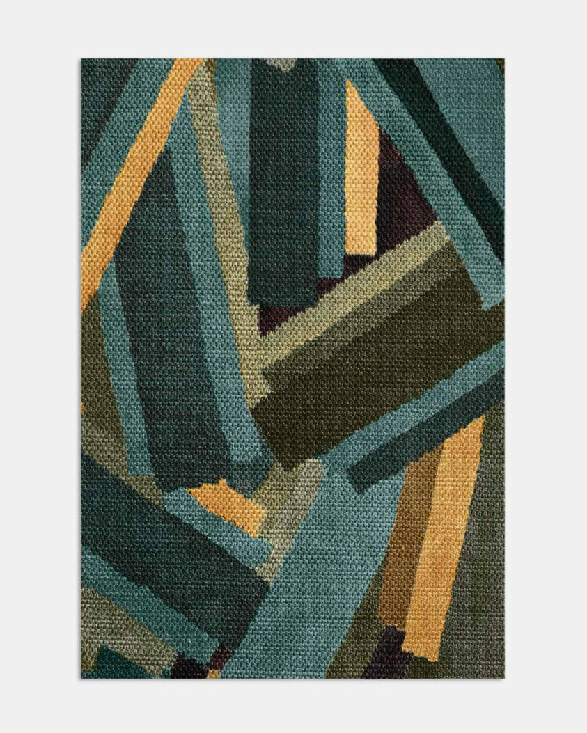 Abstract patterned rug with green, brown, and yellow colours on a white background,  available  to buy on the-salon.com. SALON curates the finest , unique, handmade pieces from the interior industry's best makers and brands. Shop luxury furniture, lighting, rugs, art, antiques and vintage pieces and accessories from SALON interior designed rooms.