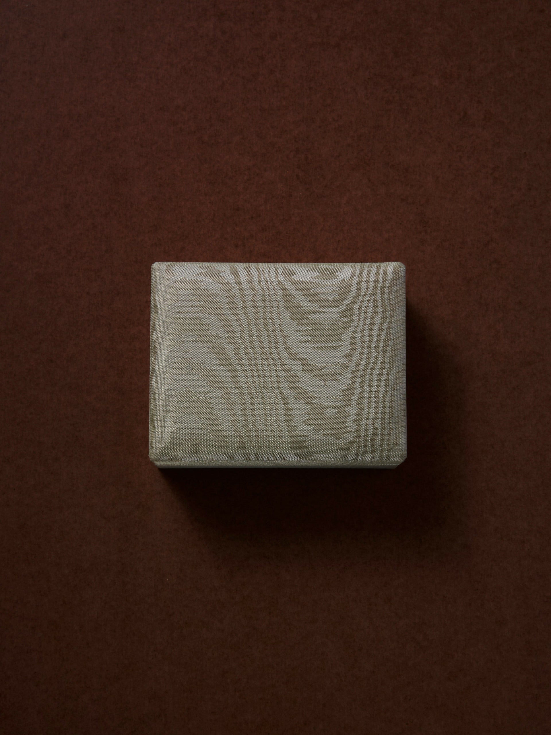 Rectangular stone with wood grain pattern on a brown background,  available  to buy on the-salon.com. SALON curates the finest , unique, handmade pieces from the interior industry's best makers and brands. Shop luxury furniture, lighting, rugs, art, antiques and vintage pieces and accessories from SALON interior designed rooms.