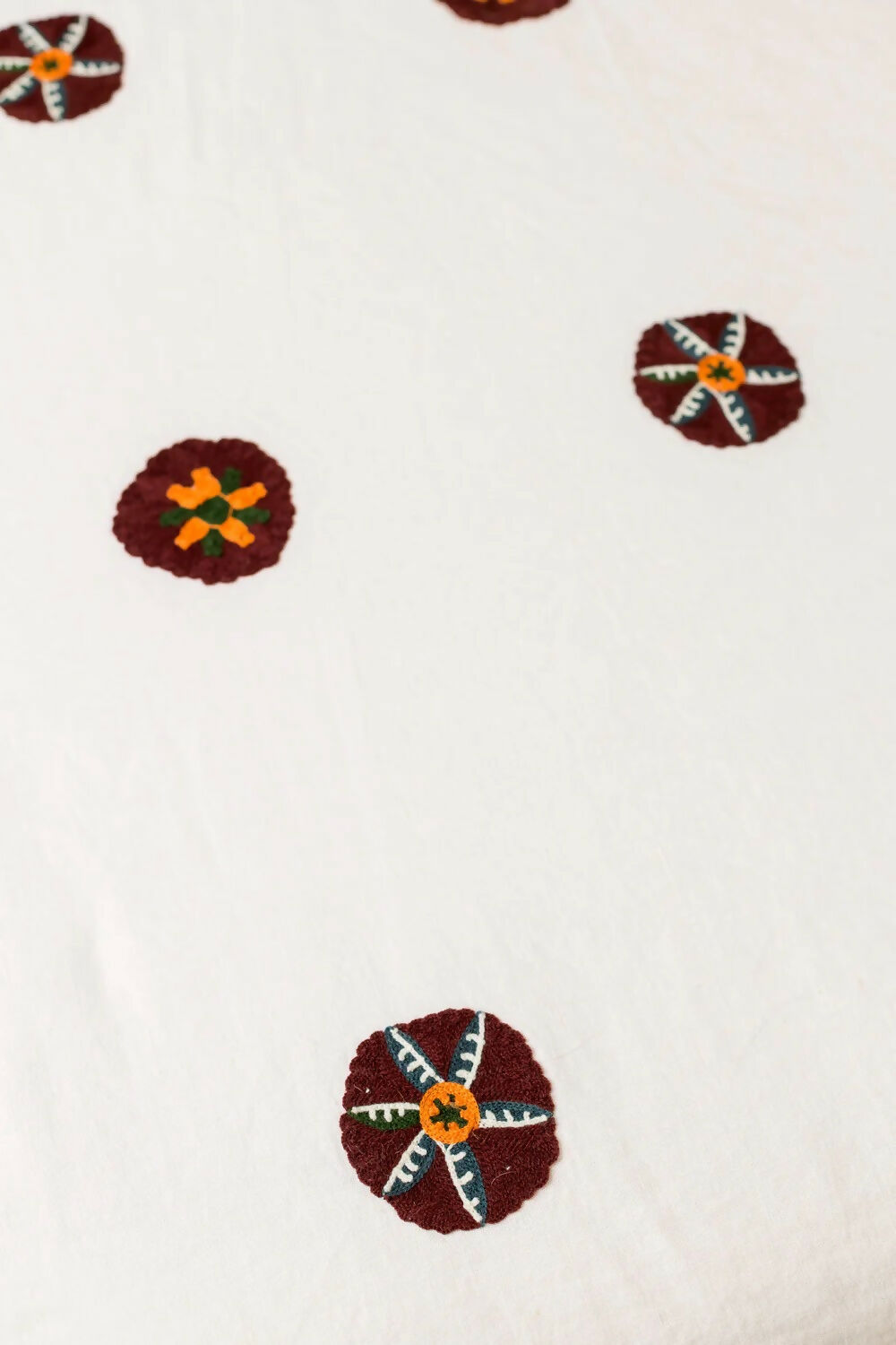 Decorative elements on a white tablecloth,  available  to buy on the-salon.com. SALON curates the finest , unique, handmade pieces from the interior industry's best makers and brands. Shop luxury furniture, lighting, rugs, art, antiques and vintage pieces and accessories from SALON interior designed rooms.