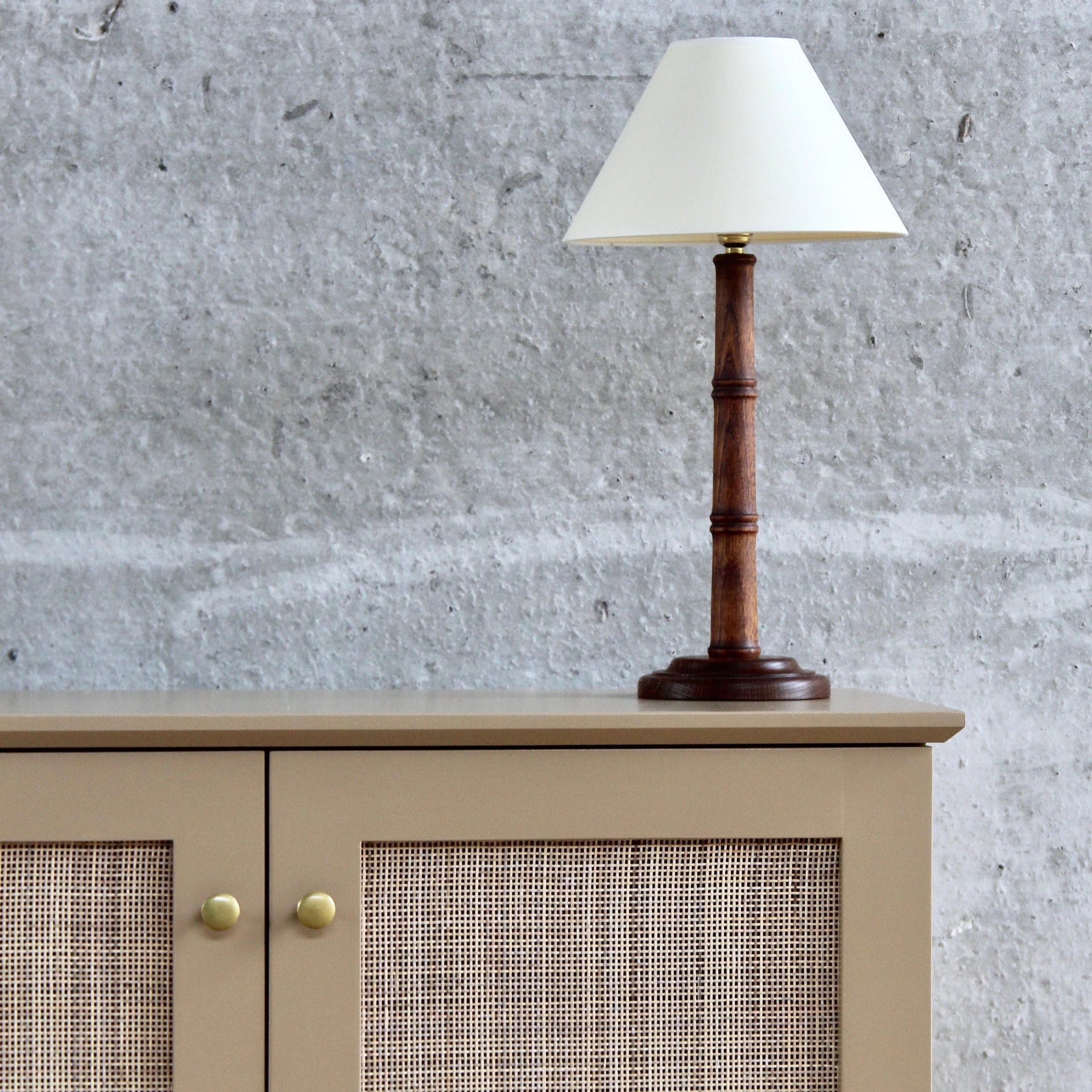 CANED CABINET BY ALFRED NEWALL