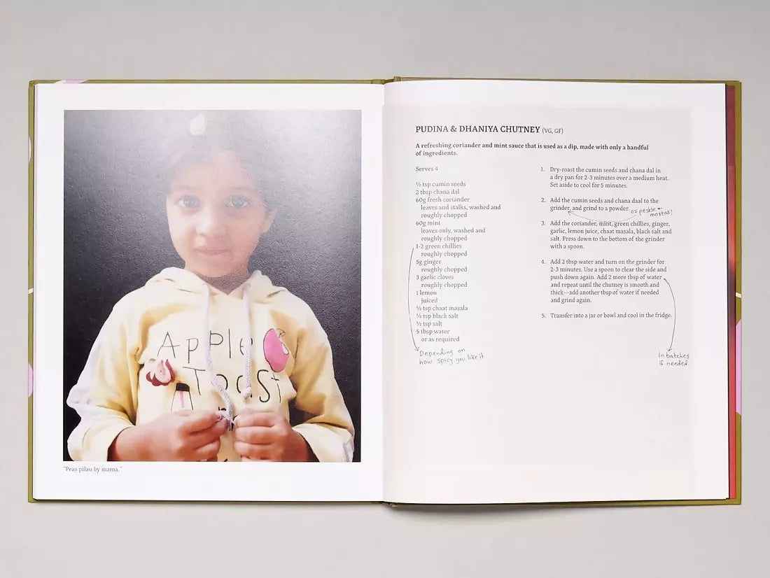 Open book, pages to a recipe of pudina & dhaniya chutney and an image of a young girl with a yellow jumper,  available  to buy on the-salon.com. SALON curates the finest , unique, handmade pieces from the interior industry's best makers and brands. Shop luxury furniture, lighting, rugs, art, antiques and vintage pieces and accessories from SALON interior designed rooms.