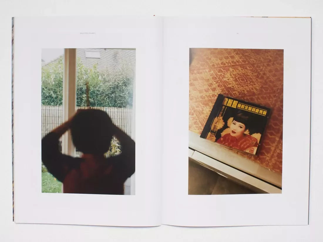An image of an open book, the pages containing photos of a CD case and a person infront of a garden,  available  to buy on the-salon.com. SALON curates the finest , unique, handmade pieces from the interior industry's best makers and brands. Shop luxury furniture, lighting, rugs, art, antiques and vintage pieces and accessories from SALON interior designed rooms.