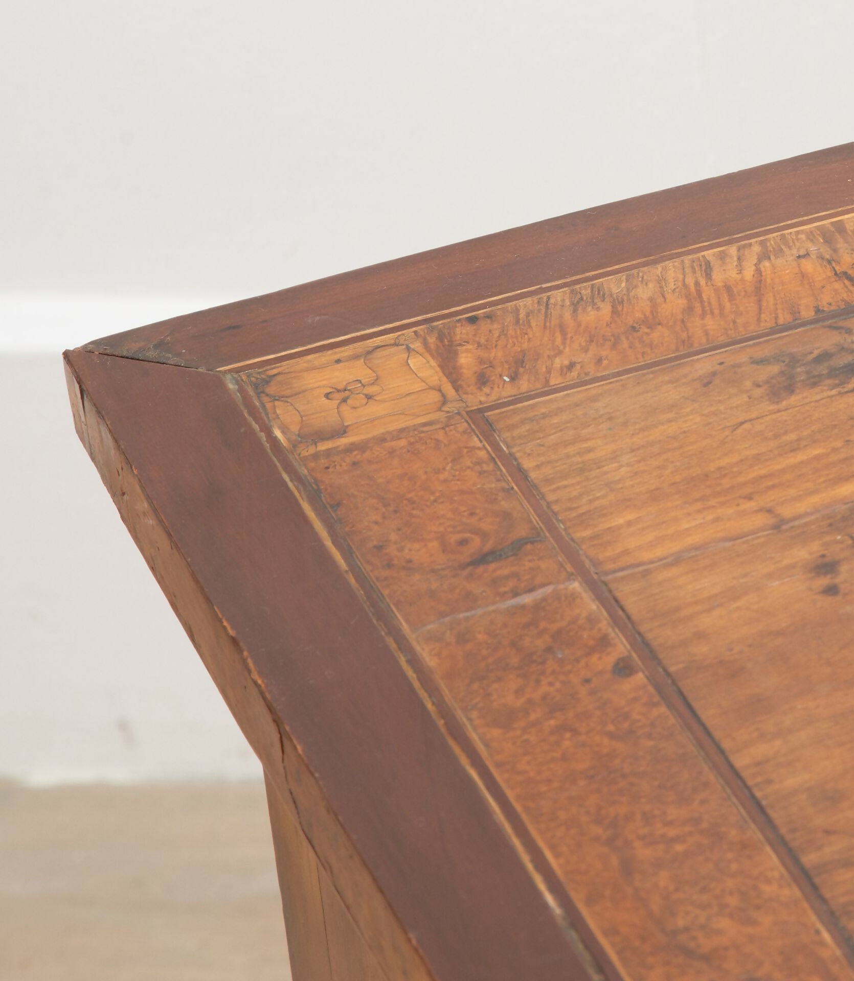 Close-up of a wooden surface with a white background,  available  to buy on the-salon.com. SALON curates the finest , unique, handmade pieces from the interior industry's best makers and brands. Shop luxury furniture, lighting, rugs, art, antiques and vintage pieces and accessories from SALON interior designed rooms.