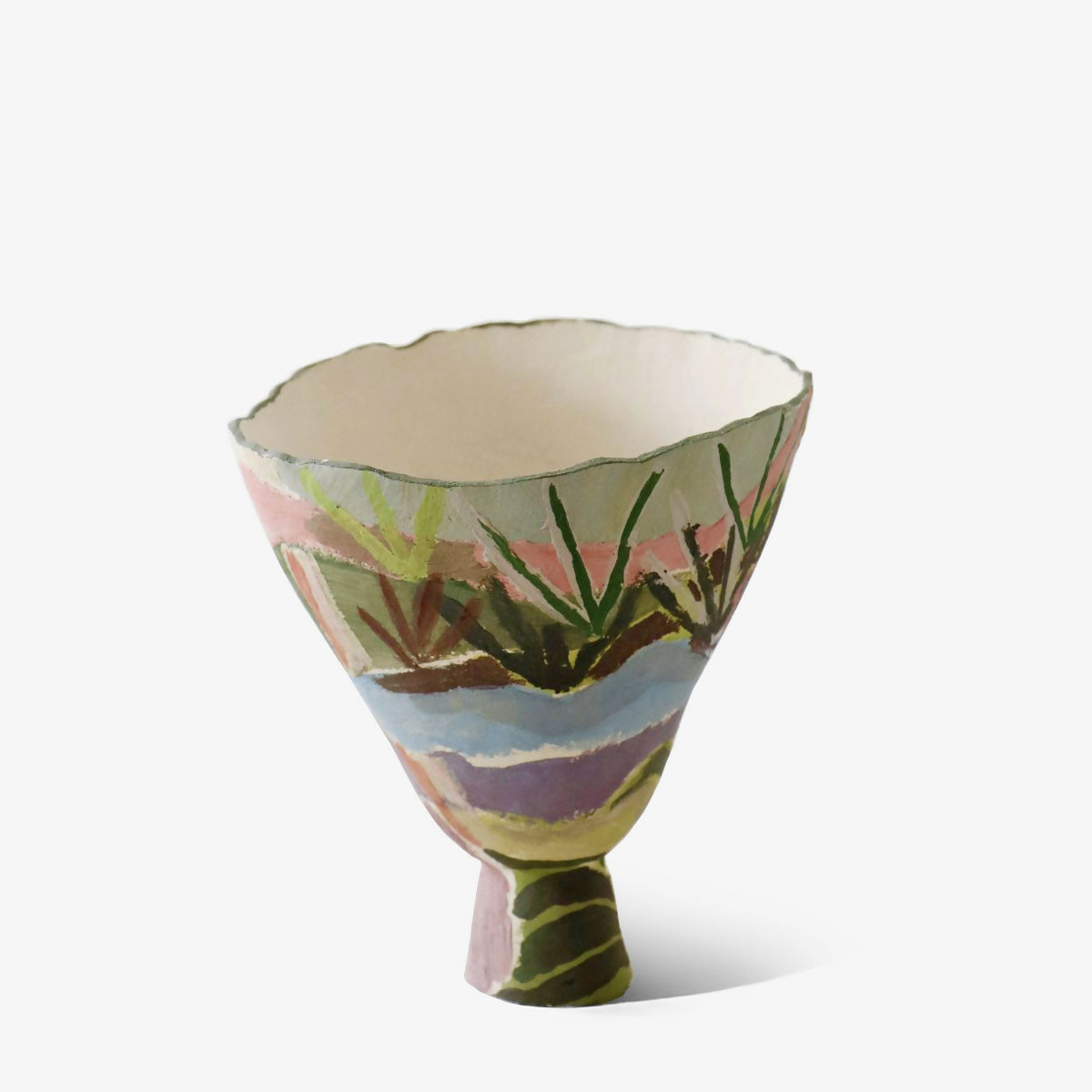 Hand-built, footed bowl with a landscape painting style on the side, made from stoneware clay,  available  to buy on the-salon.com. SALON curates the finest , unique, handmade pieces from the interior industry's best makers and brands. Shop luxury furniture, lighting, rugs, art, antiques and vintage pieces and accessories from SALON interior designed rooms.