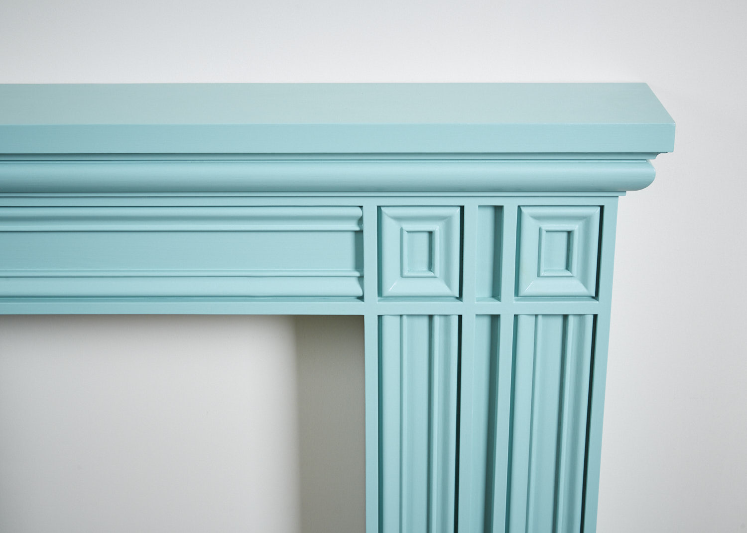 A close up of the handcrafted wood with squared details,  available  to buy on the-salon.com. SALON curates the finest , unique, handmade pieces from the interior industry's best makers and brands. Shop luxury furniture, lighting, rugs, art, antiques and vintage pieces and accessories from SALON interior designed rooms.