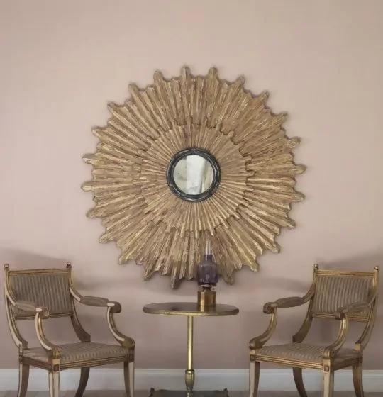 An image of the colour "Mason Pink" in use on the walls, in the background of a gold chair set and a gold mirror on the wall,  available  to buy on the-salon.com. SALON curates the finest , unique, handmade pieces from the interior industry's best makers and brands. Shop luxury furniture, lighting, rugs, art, antiques and vintage pieces and accessories from SALON interior designed rooms.