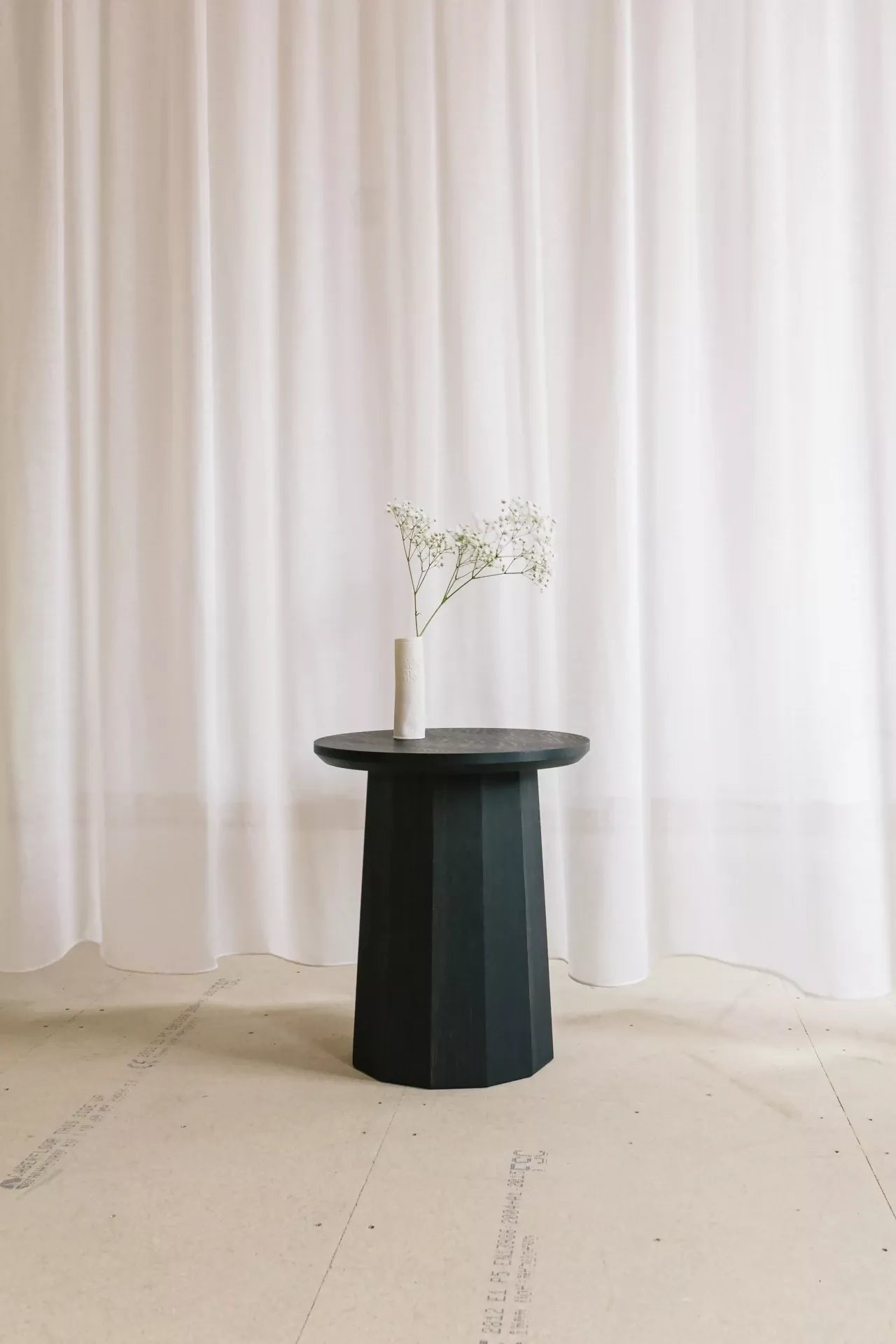 POLYGON PEDESTAL SIDE TABLE BY GALVIN BROTHERS