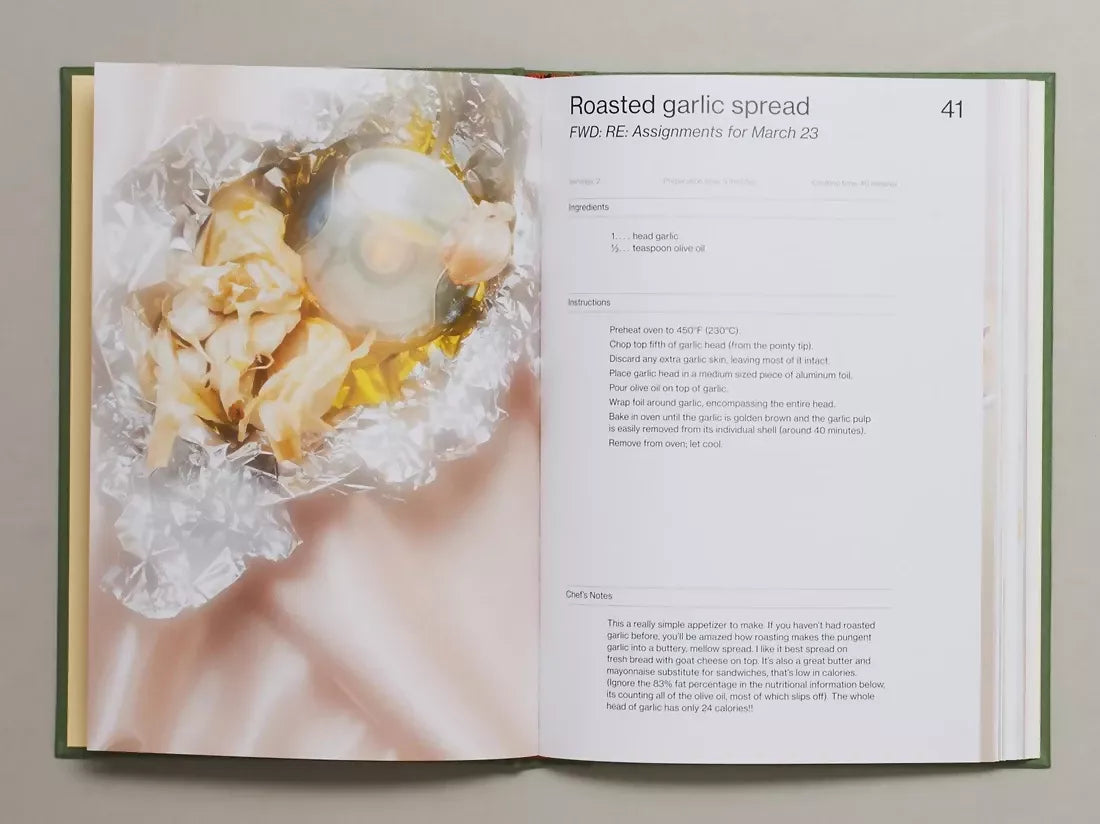 Open book, page to an image of garlic and then an email like instructions on how to make roasted garlic spread, available  to buy on the-salon.com. SALON curates the finest , unique, handmade pieces from the interior industry's best makers and brands. Shop luxury furniture, lighting, rugs, art, antiques and vintage pieces and accessories from SALON interior designed rooms.
