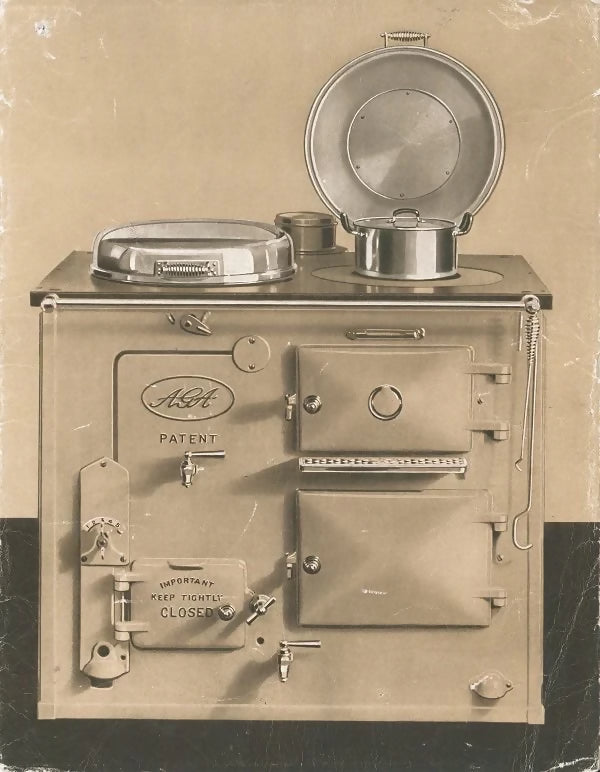 A vintage image of an Aga range cooker with the lid open, showcasing the interior compartments,  available  to buy on the-salon.com. SALON curates the finest , unique, handmade pieces from the interior industry's best makers and brands. Shop luxury furniture, lighting, rugs, art, antiques and vintage pieces and accessories from SALON interior designed rooms.