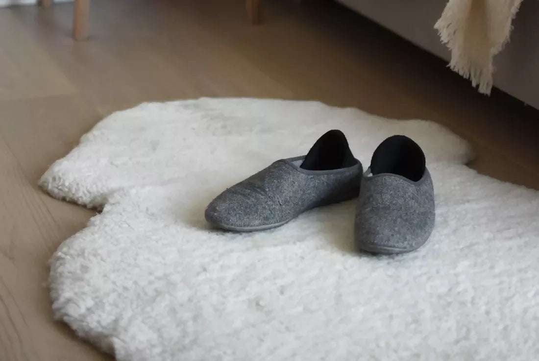 White sheepskin rug. The rug, available to buy from the-salon.com. SALON curates the finest unique handmade pieces from the interior industry's best makers and brands. Shop luxury furniture, lighting, rugs, art, antiques and vintage pieces and accessories from SALON interior designed rooms.