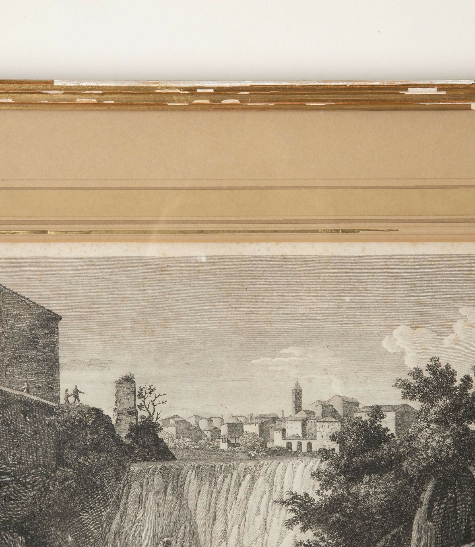 Vintage-style black and white print of a waterfall and town scene, framed with a gold border,  available  to buy on the-salon.com. SALON curates the finest , unique, handmade pieces from the interior industry's best makers and brands. Shop luxury furniture, lighting, rugs, art, antiques and vintage pieces and accessories from SALON interior designed rooms.