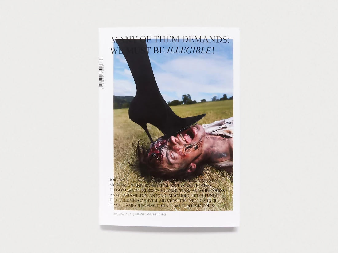 Cover of 'MANY OF THEM - ISSUE #11' featuring a provocative image with a high heel and text overlay, representing the magazine's themes of resistance and ambiguity,  available  to buy on the-salon.com. SALON curates the finest , unique, handmade pieces from the interior industry's best makers and brands. Shop luxury furniture, lighting, rugs, art, antiques and vintage pieces and accessories from SALON interior designed rooms.