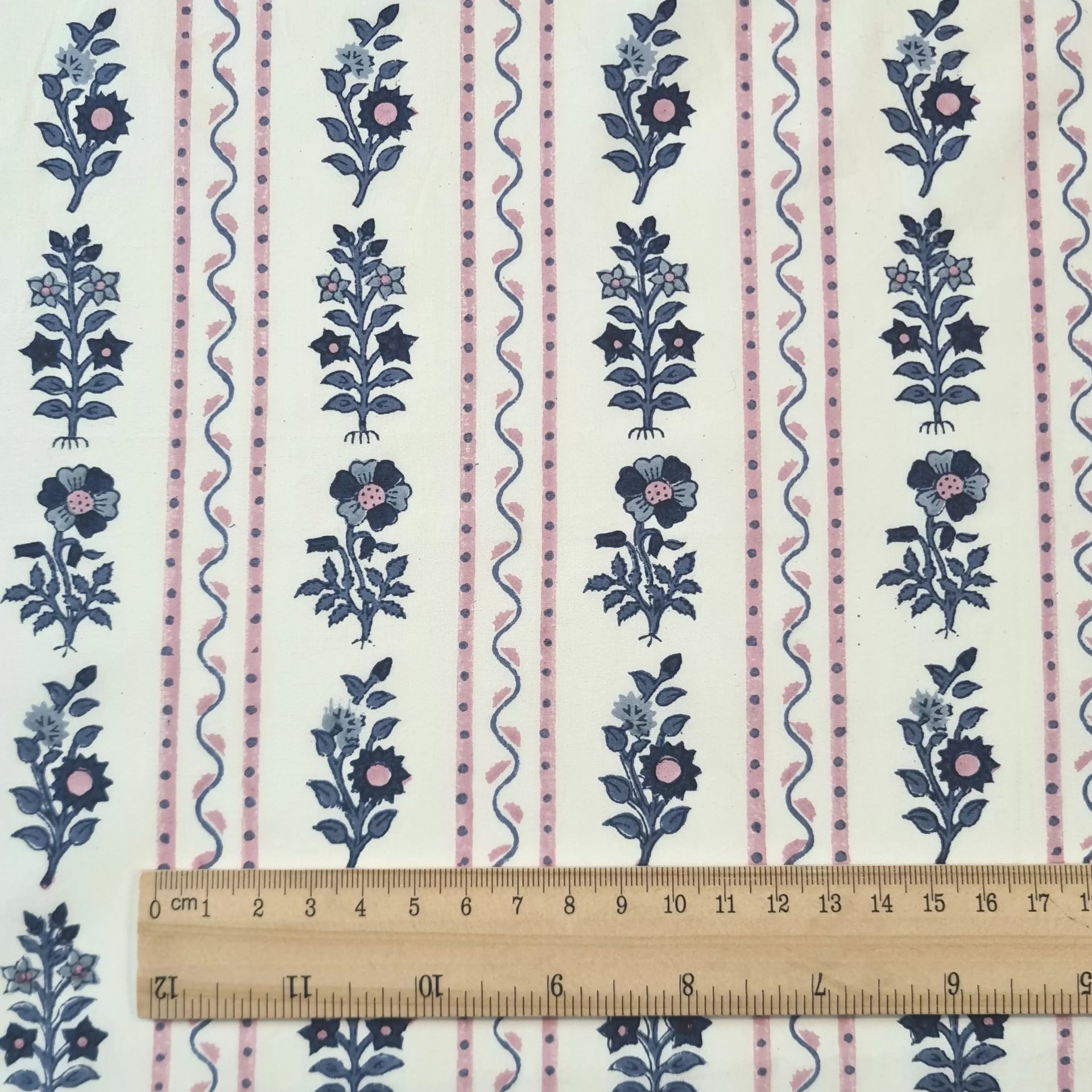 Floral and striped pattern with a ruler for scale on a white background,  available  to buy on the-salon.com. SALON curates the finest , unique, handmade pieces from the interior industry's best makers and brands. Shop luxury furniture, lighting, rugs, art, antiques and vintage pieces and accessories from SALON interior designed rooms.