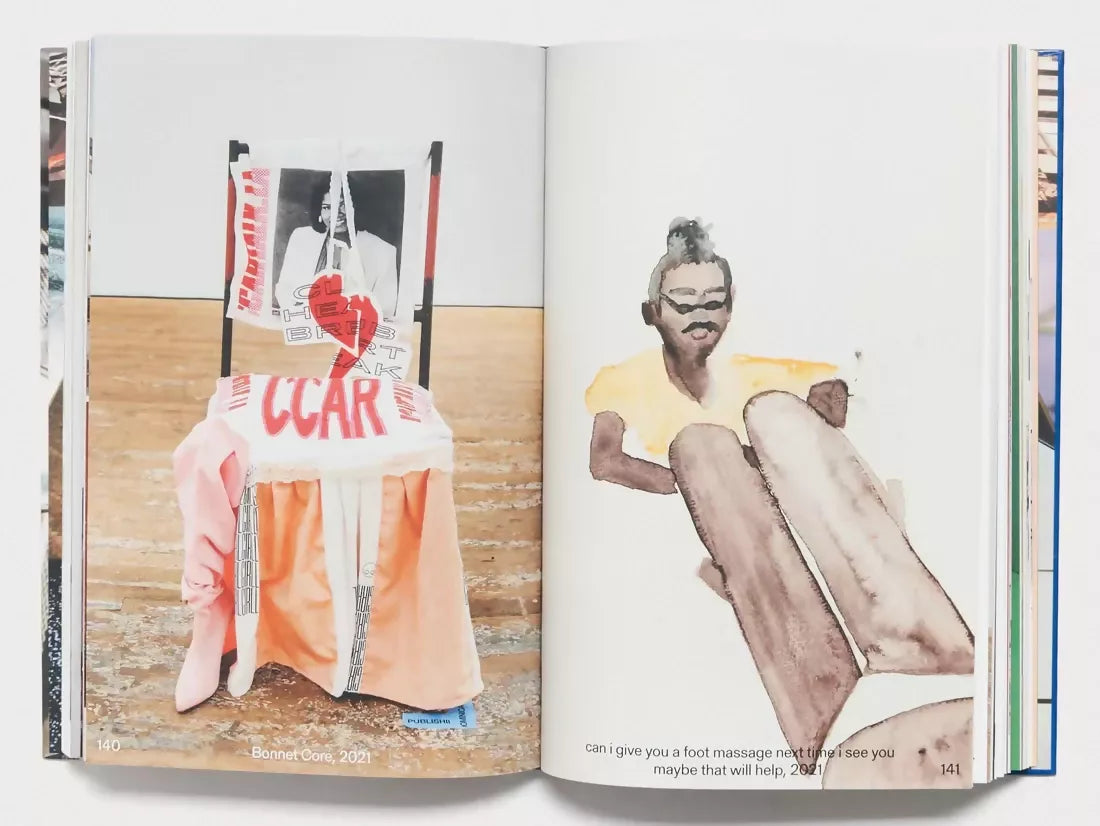 An image of an open book at two pictures, one being a chair on a carpet in front of a white wall, the other being a man holding a woman's legs with the caption 'can I give you a foot massage next time I see you, maybe that will help' available  to buy on the-salon.com. SALON curates the finest , unique, handmade pieces from the interior industry's best makers and brands. Shop luxury furniture, lighting, rugs, art, antiques and vintage pieces and accessories from SALON interior designed rooms.
