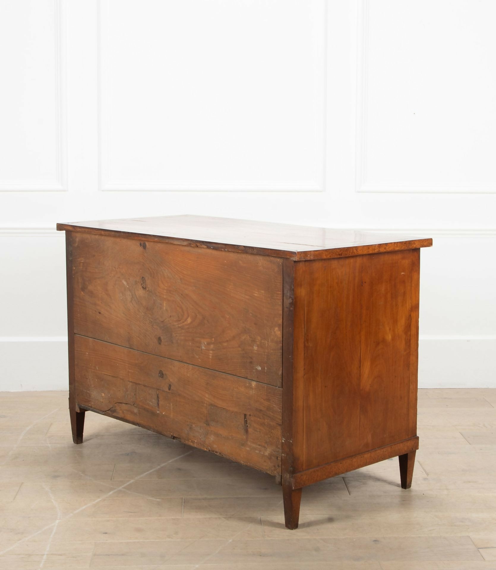 Wooden dresser with marble top on a light wooden floor and white wall background,  available  to buy on the-salon.com. SALON curates the finest , unique, handmade pieces from the interior industry's best makers and brands. Shop luxury furniture, lighting, rugs, art, antiques and vintage pieces and accessories from SALON interior designed rooms.